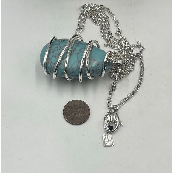 Robert Lee Morris RLM SOHO faux Turquoise Silvertone wrap chunk
Pendant Necklace - Picture 5 of 7